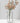 Clear glass vase with pink flowers on a white background