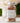 Glass jar of bath salts labeled 'Petite Rose & Salt' with a floral background