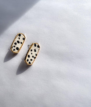 Saje Rose® Jasmine Hexagon Earrings made of Genuine Calf Hair | White Cheetah Print | Post back closure | Available to order on shopsajerose.com